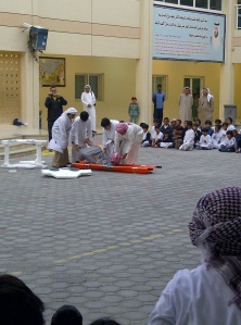 This is a rather morbid traffic safety demonstration presented by the students. Of course, they all cheer the crazy driver and the crash. I'm not sure this program is effective. Google traffic accidents in the UAE. Gruesome. 